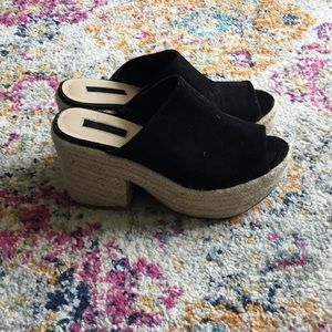 Black suede slip ones